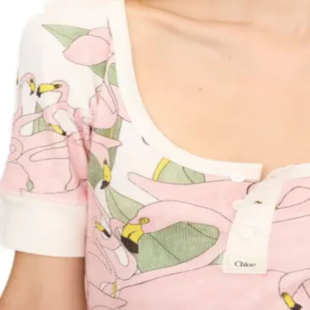 🌸 Top Chloe a costine con stampa di fenicotteri rosa